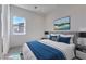 Comfortable bedroom featuring a queen-size bed and sunny window at 5429 Succulent Rose Dr, Las Vegas, NV 89135