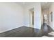Spacious empty bedroom with hardwood floors and neutral white paint at 5429 Succulent Rose Dr, Las Vegas, NV 89135