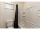 Bathroom featuring a pristine white tub and shower, offering a clean and modern aesthetic at 5633 Alitak Bay St, North Las Vegas, NV 89081