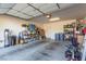 Spacious garage, offering ample storage and parking with organizational shelving at 5633 Alitak Bay St, North Las Vegas, NV 89081