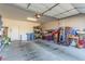 Spacious two-car garage featuring ample storage space and a bright overhead light at 5633 Alitak Bay St, North Las Vegas, NV 89081