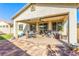 Back patio offers a great space for outdoor living and entertaining, featuring modern finishings at 5633 Alitak Bay St, North Las Vegas, NV 89081