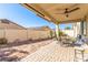 Enjoy outdoor living on this charming patio with a ceiling fan and ample seating at 5633 Alitak Bay St, North Las Vegas, NV 89081