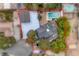 Overhead view showcasing the property's layout with pool, detached garage, landscaping and defined property lines at 5741 S Pearl St, Las Vegas, NV 89120