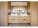 Modern bathroom with dual square vessel sinks, matte black faucets, and stylish wood cabinetry at 5741 S Pearl St, Las Vegas, NV 89120