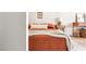 Stylish bedroom with patterned bedding, wood nightstand, and modern decor at 5741 S Pearl St, Las Vegas, NV 89120