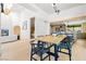 Dining area with an open layout and stone column separating it from living areas at 5741 S Pearl St, Las Vegas, NV 89120