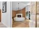 Bright living room offers wood slat wall accents, fireplace, modern decor, and wood-style flooring at 5741 S Pearl St, Las Vegas, NV 89120