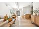 A bright open-concept living area with a breakfast bar, dining area and contemporary furnishings at 5741 S Pearl St, Las Vegas, NV 89120