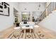 Open-concept living room featuring stone columns and a seating area with modern decor at 5741 S Pearl St, Las Vegas, NV 89120