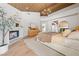 Cozy main bedroom with hardwood floors, fireplace, and stylish decor, offering comfort and relaxation at 5741 S Pearl St, Las Vegas, NV 89120