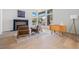 Bright sitting room features a fireplace and large windows for natural light at 5741 S Pearl St, Las Vegas, NV 89120