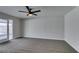 Bedroom featuring new carpet and access to the backyard at 5800 Balzar Ave, Las Vegas, NV 89108