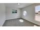 Bright bedroom with new carpet and unique window features at 5800 Balzar Ave, Las Vegas, NV 89108