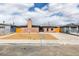 Charming single-story home with a unique brick facade and modern landscaping at 5800 Balzar Ave, Las Vegas, NV 89108