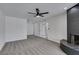 Spacious living room features neutral paint and a fireplace at 5800 Balzar Ave, Las Vegas, NV 89108