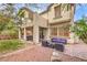 Spacious backyard with a patio, hot tub, and lush landscaping, perfect for outdoor living at 6554 Macdoogle St, Las Vegas, NV 89166