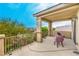 Relaxing covered balcony with comfortable chairs and peaceful outdoor views at 6554 Macdoogle St, Las Vegas, NV 89166