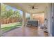 Outdoor patio has a relaxing hot tub and lush backyard, perfect for enjoying the outdoors at 6554 Macdoogle St, Las Vegas, NV 89166