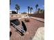 Backyard featuring palm trees, desert landscaping, and rock ground cover at 6596 Secluded Ave, Las Vegas, NV 89110