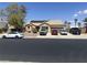Charming single-story home featuring a tile roof, solar panels, desert landscaping, and a multi-car driveway at 6596 Secluded Ave, Las Vegas, NV 89110