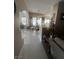 Hallway with views into the dining room and kitchen at 6596 Secluded Ave, Las Vegas, NV 89110