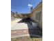 Covered patio with workout equipment near pool, and well maintained yard at 6596 Secluded Ave, Las Vegas, NV 89110