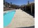 A beautiful backyard pool with a patio and a covered porch area is perfect for outdoor relaxation and entertaining at 6596 Secluded Ave, Las Vegas, NV 89110
