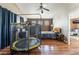 Bedroom with wood floor, trampoline, and furniture at 6715 Maple Mesa St, North Las Vegas, NV 89084