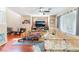 Bright living room features a ceiling fan, hardwood floors, and plenty of room for activities at 6715 Maple Mesa St, North Las Vegas, NV 89084