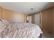 Comfortable bedroom featuring neutral tones, a soft bed, and natural light, creating a relaxing and inviting space at 675 Harbor Mist Ave, Henderson, NV 89015