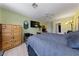 Spacious bedroom with carpet, ceiling fan and closet at 675 Harbor Mist Ave, Henderson, NV 89015