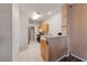 Kitchen features open access to laundry and an open concept view to the living area at 675 Harbor Mist Ave, Henderson, NV 89015