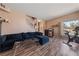 Spacious living room with modern decor, sleek flooring, and ample natural light at 675 Harbor Mist Ave, Henderson, NV 89015