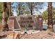 Stone Canyon community sign with desert landscaping and stone accents at 675 Harbor Mist Ave, Henderson, NV 89015