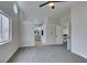 A spacious bedroom with gray carpet and an ensuite bathroom provides ample living space at 71 Sea Holly Way, Henderson, NV 89074