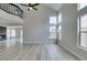 Bright and airy living room with high ceilings and large windows at 71 Sea Holly Way, Henderson, NV 89074