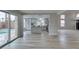 Bright open-concept living space, seamlessly connects to the kitchen and offers access to the outdoors at 71 Sea Holly Way, Henderson, NV 89074