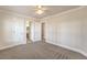 Large bedroom with access to bathroom, carpeted flooring and multiple closets, providing plenty of storage space at 7300 Breezy Night Ct, Las Vegas, NV 89129