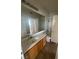 A bathroom features a large mirror, vanity, and combination tub and shower at 75 N Valle Verde Dr # 625, Henderson, NV 89074