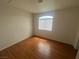 Bedroom with vinyl floors and a bright window at 75 N Valle Verde Dr # 625, Henderson, NV 89074