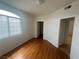 This is a bedroom with laminate floors and a large window at 75 N Valle Verde Dr # 625, Henderson, NV 89074