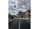 Condo complex exterior with landscaped grounds and assigned parking spaces available at 75 N Valle Verde Dr # 625, Henderson, NV 89074