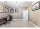 Home office with neutral walls, tile flooring, ceiling fan, and traditional wood desk setup at 7559 Chambery Cove Ct, Las Vegas, NV 89123