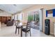 Eat-in kitchen provides backyard access through sliding glass door to a shaded patio area at 7559 Chambery Cove Ct, Las Vegas, NV 89123