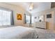 Bright main bedroom with neutral tones, vaulted ceilings, and comfortable carpeted floors at 7559 Chambery Cove Ct, Las Vegas, NV 89123