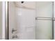Detail of tiled bathtub and shower enclosure at 7559 Chambery Cove Ct, Las Vegas, NV 89123
