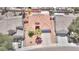 Aerial view of a single Gathering home with tile roofing, desert landscaping, and a private backyard pool at 7909 Sierra Rim Dr, Las Vegas, NV 89131