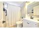Updated bathroom with modern white vanity, decorative floor tile, and shower with bright lighting at 7909 Sierra Rim Dr, Las Vegas, NV 89131