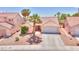 Charming single-story home with desert landscaping, tile roof, and a two-car garage at 7909 Sierra Rim Dr, Las Vegas, NV 89131